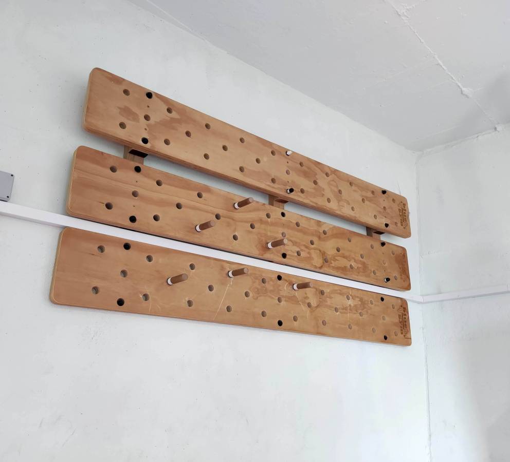 Gym peg board climbing wall